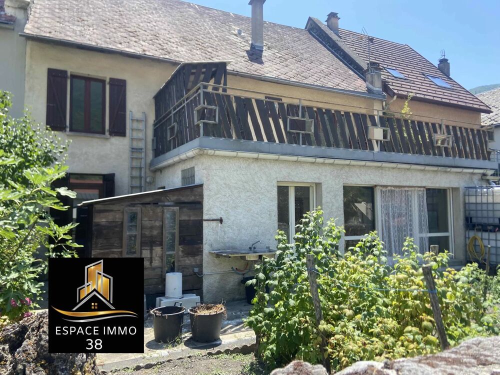 Maison mitoyenne de 185 m² composée de deux appartements ,jardin