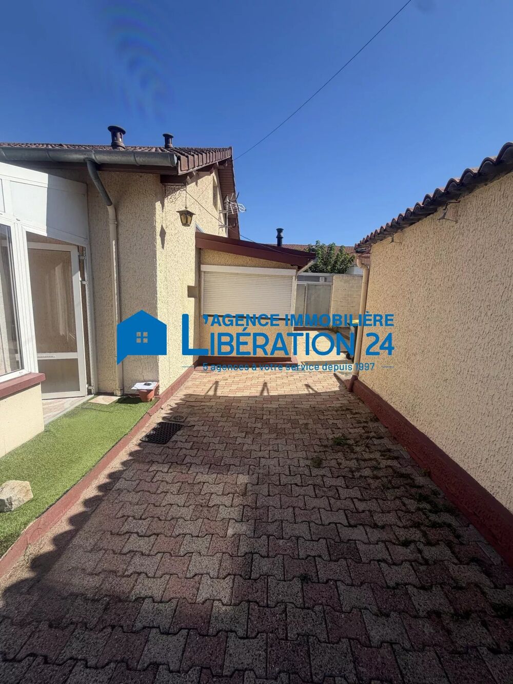 Charmante maison mitoyenne de 74 m2 avec terrain et garage - Le