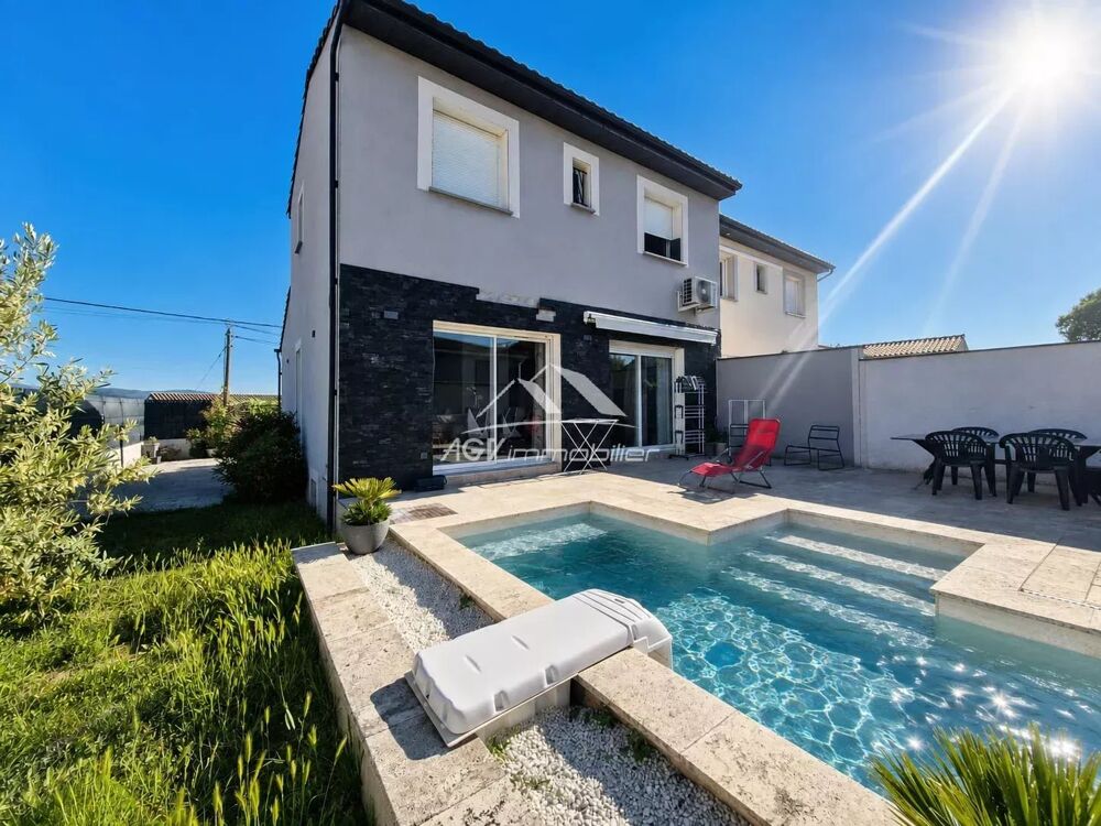 A Salindres, maison d'environ 85 m² avec piscine et garage atten