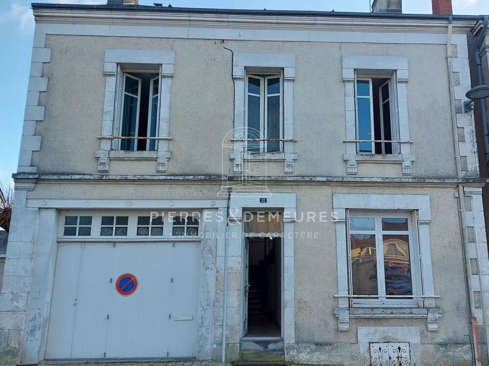 MAISON CENTRE VILLE AVEC JARDIN ET GARAGE