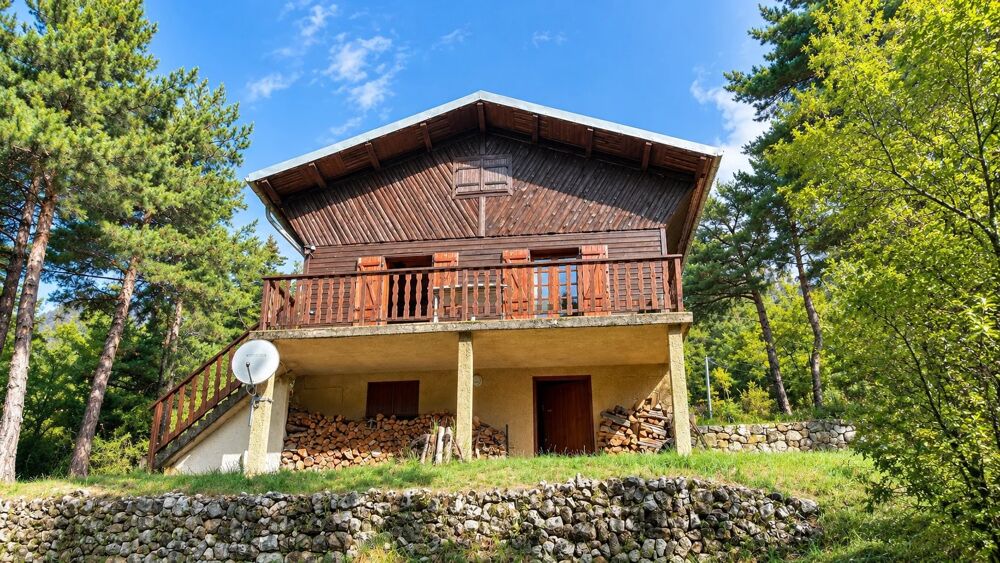 Vente Maison Chalet en bois avec terrasse plein sud et grand terrain arboré d Andon