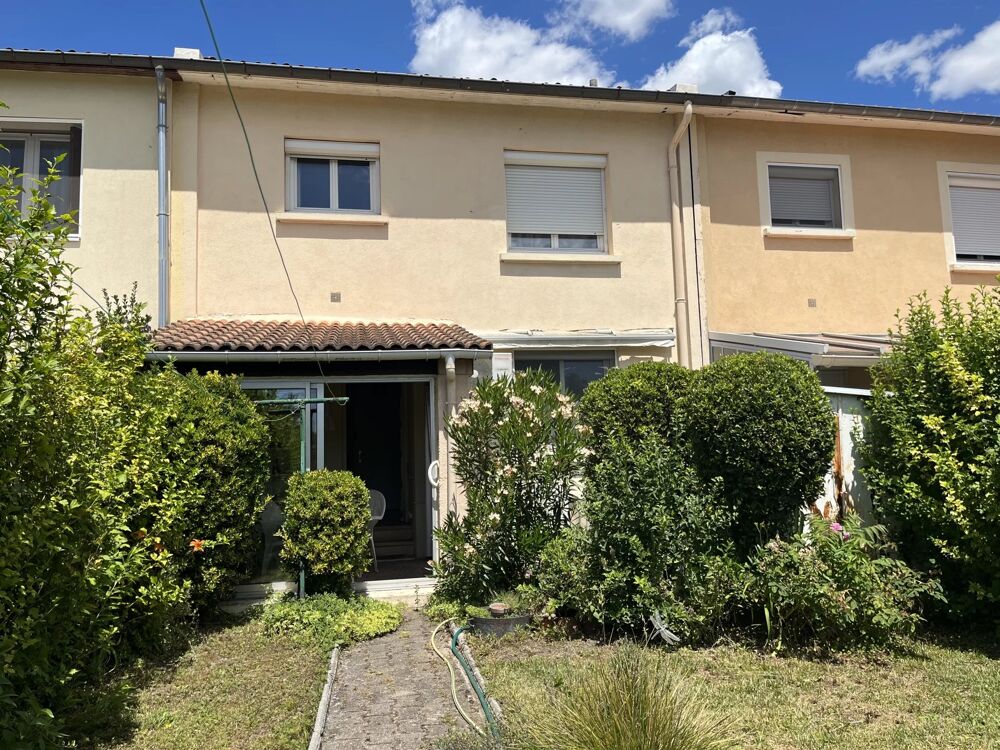 Maison 4 pièces avec jardin, garage et véranda.