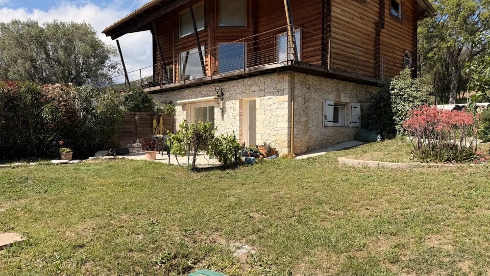 EXCLUSIVITÉ  APPARTEMENT EN REZ-DE-CHAUSSÉE AVEC JARDIN ET GARA