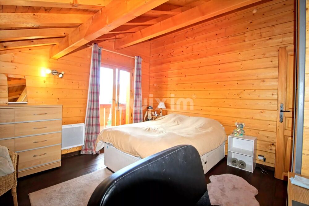À vendre  Chalet en madriers 4 pièces avec terrasse panoramique