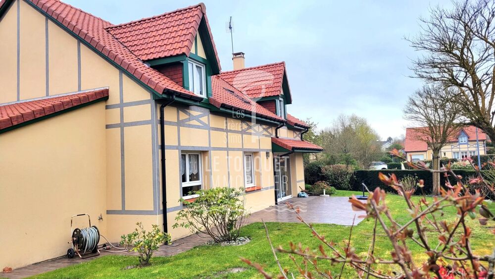 Maison avec vie de plain pied et double garage, jardin.