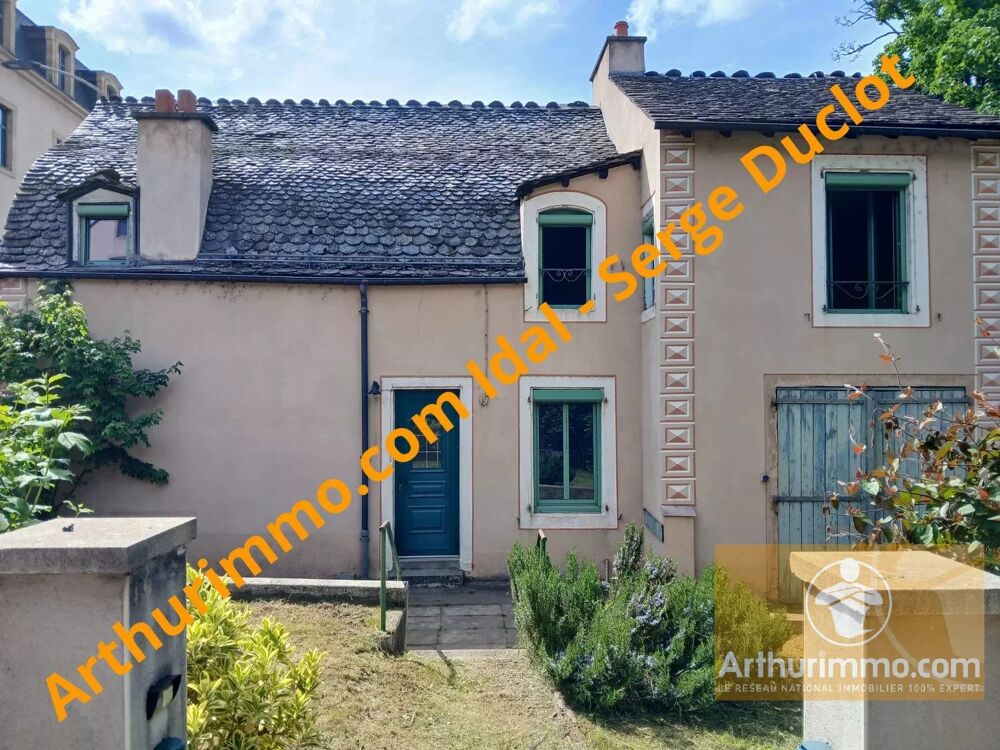 Maison de ville avec garage, terrasse et terrain  Centre de Men