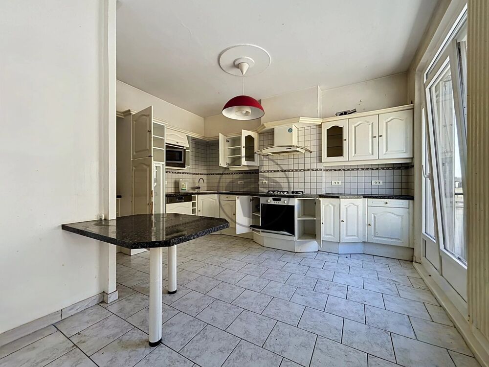 Appartement esprit maison de ville  garage  centre-ville