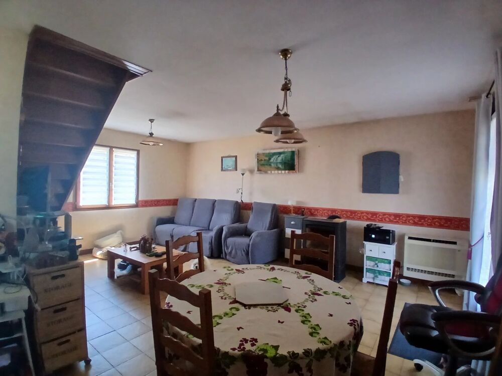 Maison de plain pied , jardin et garage