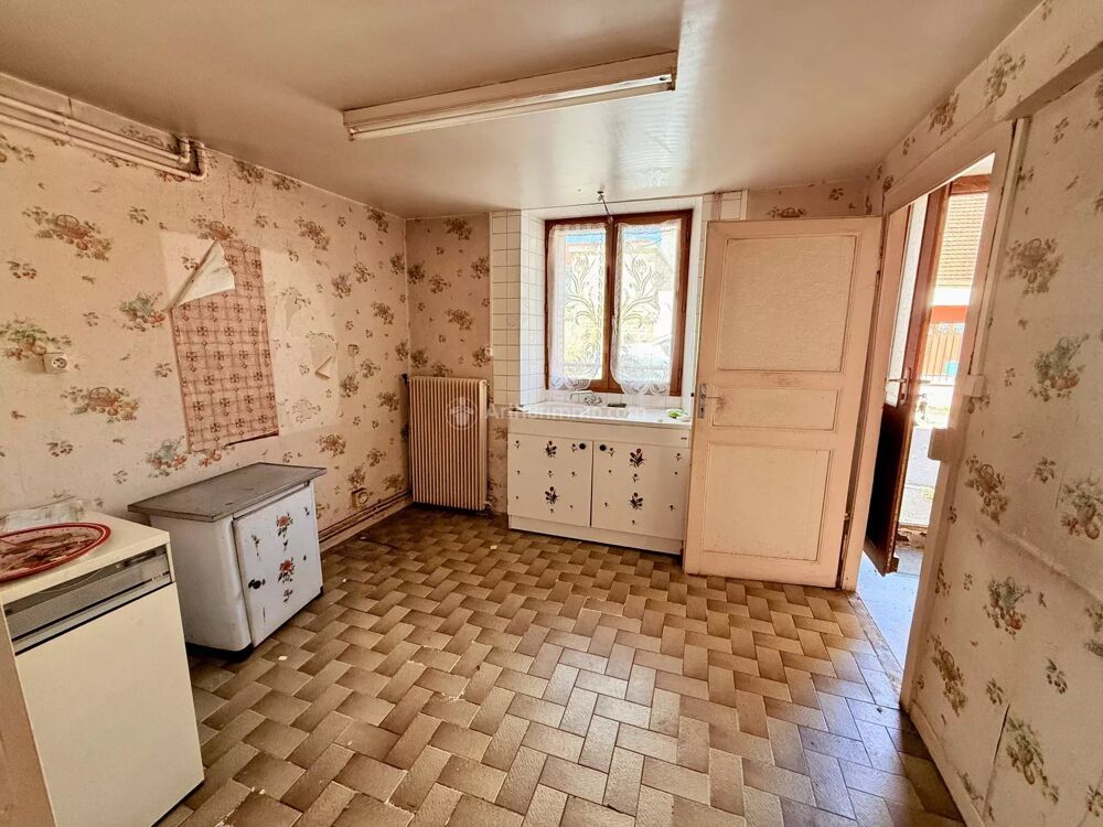 Lot de 2 maisons + 2 garages