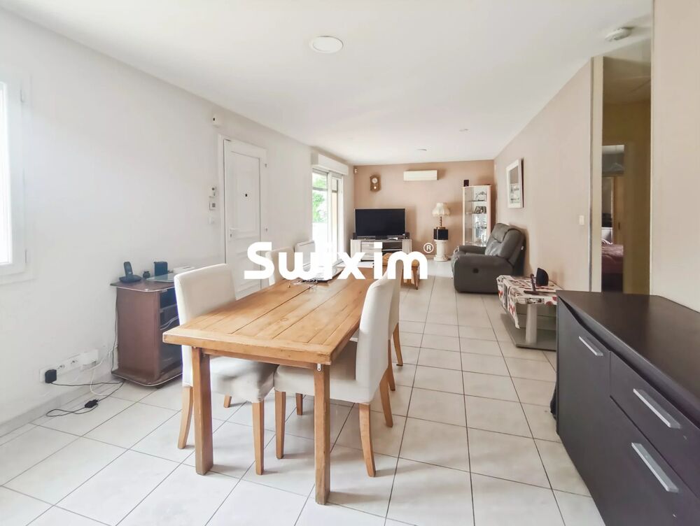 Maison de plain pied avec garage et terrain plat