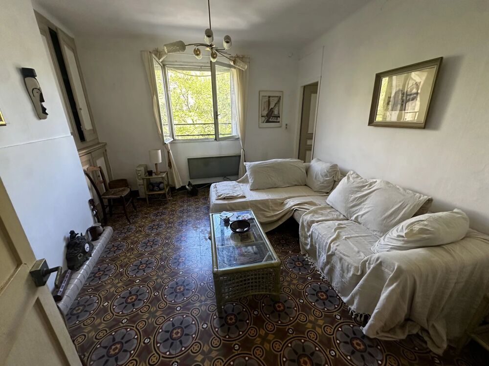 Appartement traversant, 2 chambres, 1 cave de 23 m2