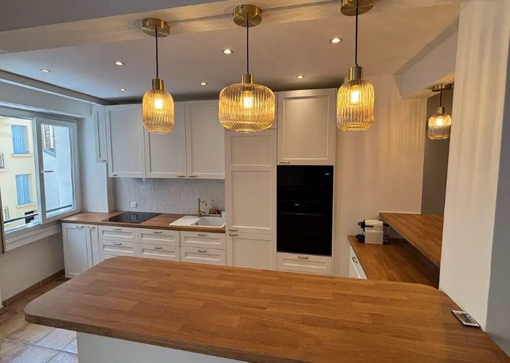 Magnifique trois pièces de 80m² avec balcon au centre ville de N
