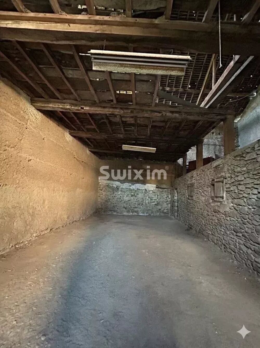 Propriété à rénover avec partie constructible