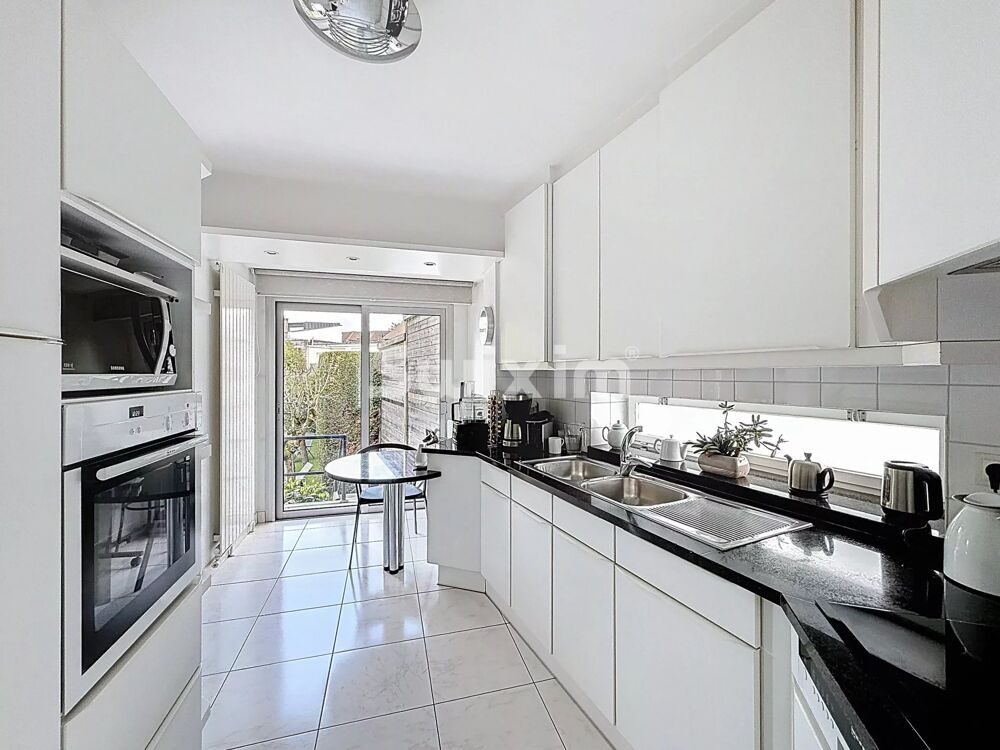 Maison individuelle avec jardin, garage double et potentiel