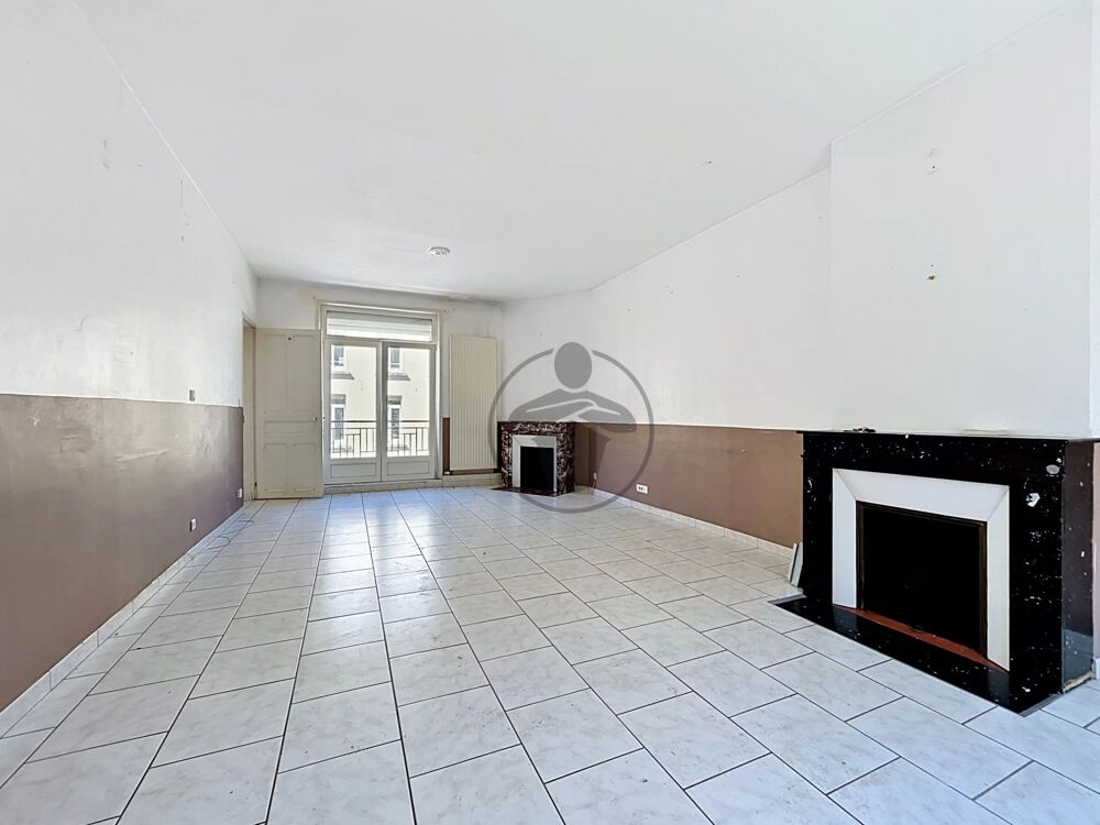 Appartement esprit maison de ville  garage  centre-ville