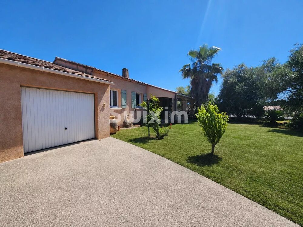 Belle maison de plain de pied avec jardin piscinable et garage.