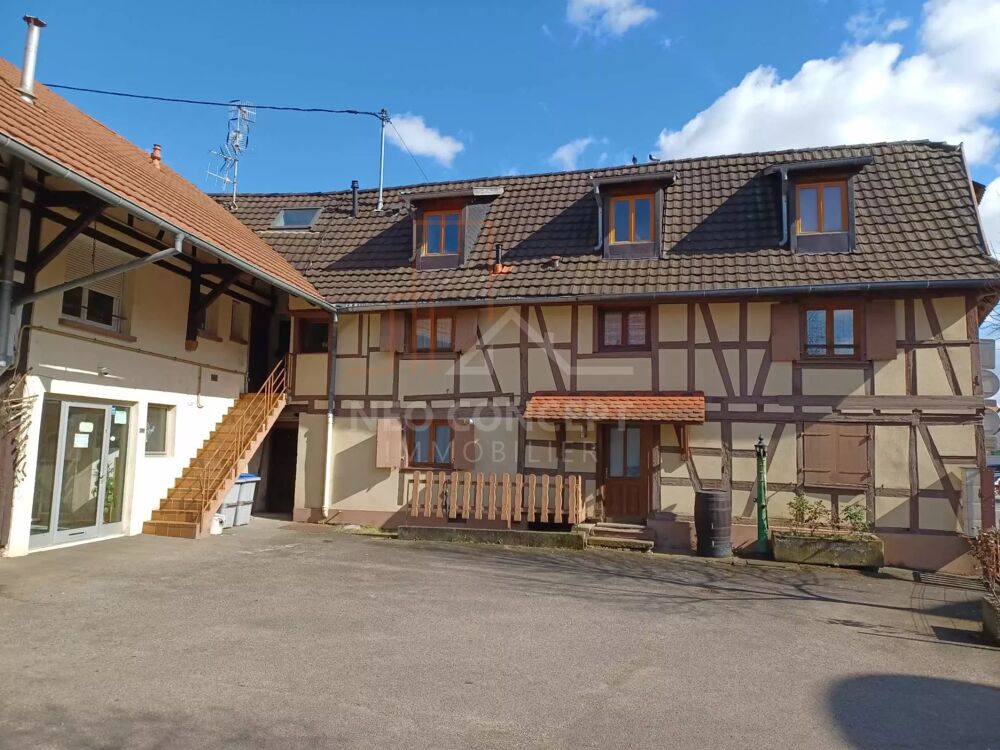 Ensemble immobilier de 6 appartements et 1 local commercial