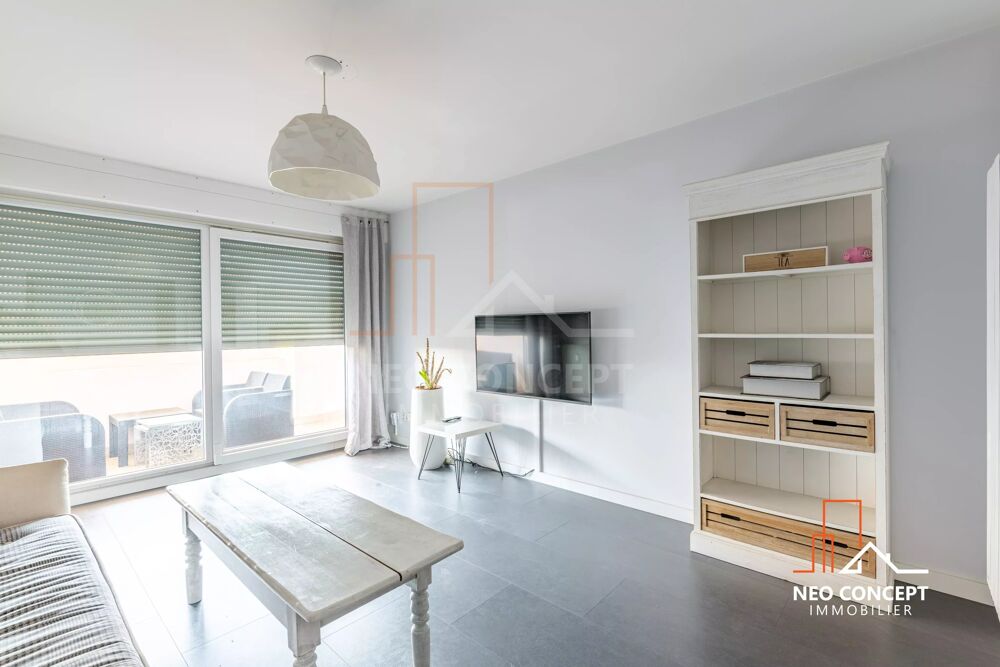 Appartement 2 pièces de 57,27 m²  Dernier étage  Ascenseur  T