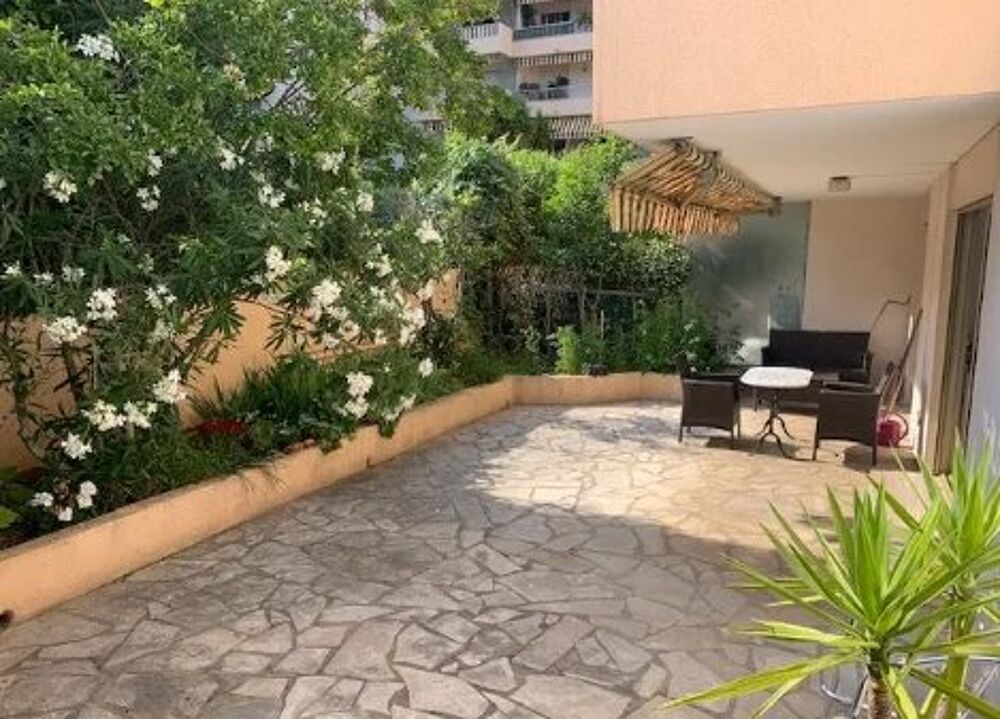 Trois pièces de 100m² avec jardin de 100m² dans résidence avec p