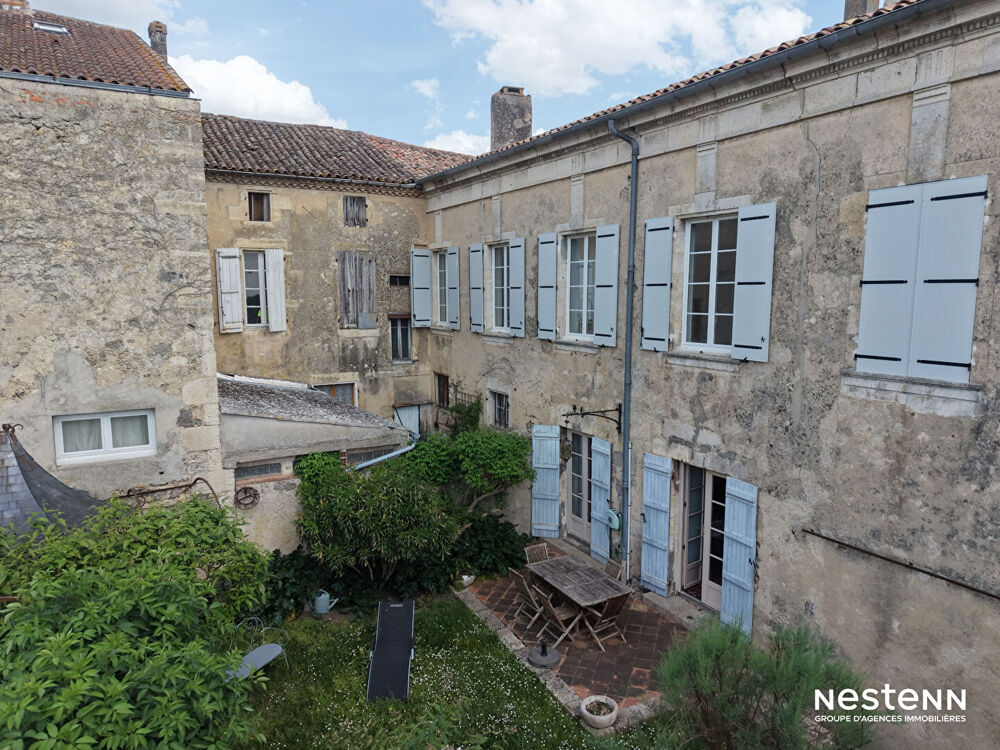 Vente Maison A Vendre Maison de ville en pierre de 339 m² avec sous-sol, garage et jardin au centre de Mézin Mezin
