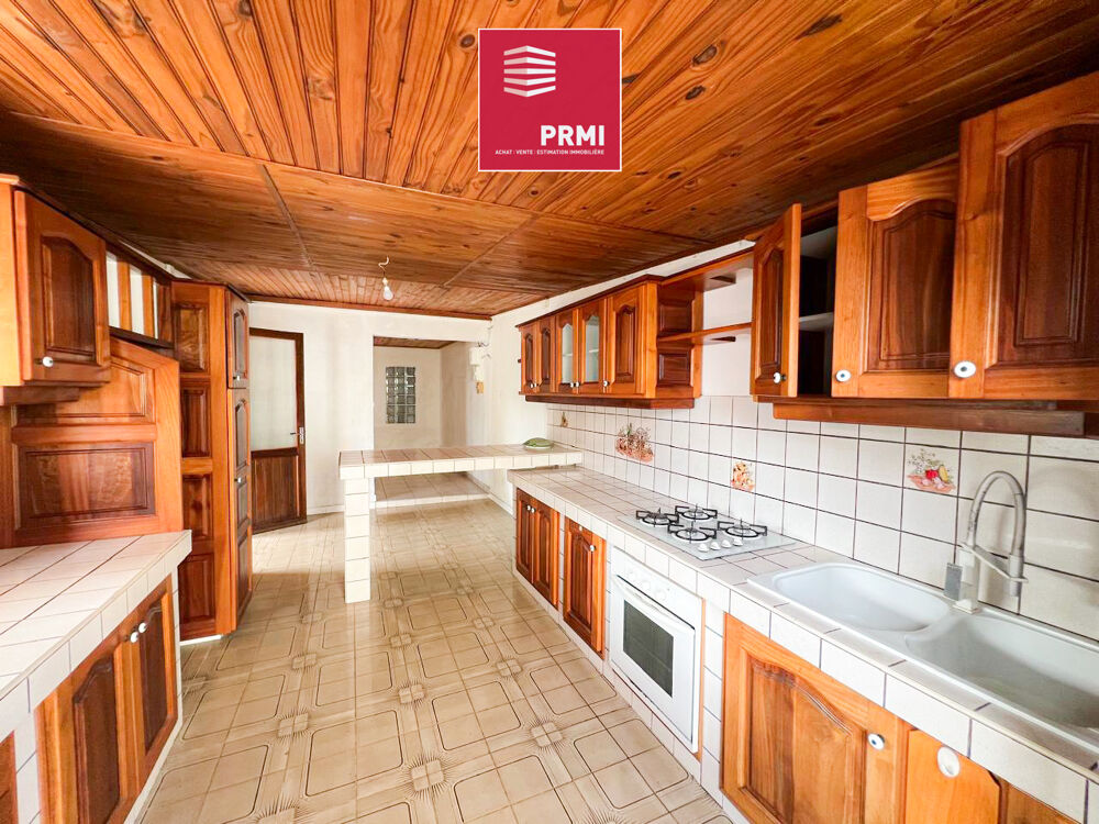 Maison de plain-pied 3 pièces à rénover avec terrain de 125 m² dans un environnement calme