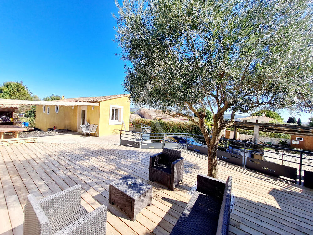 À vendre : Maison 4 faces 105 m²de plain-pied avec grand garage de 50 m² à Poussan