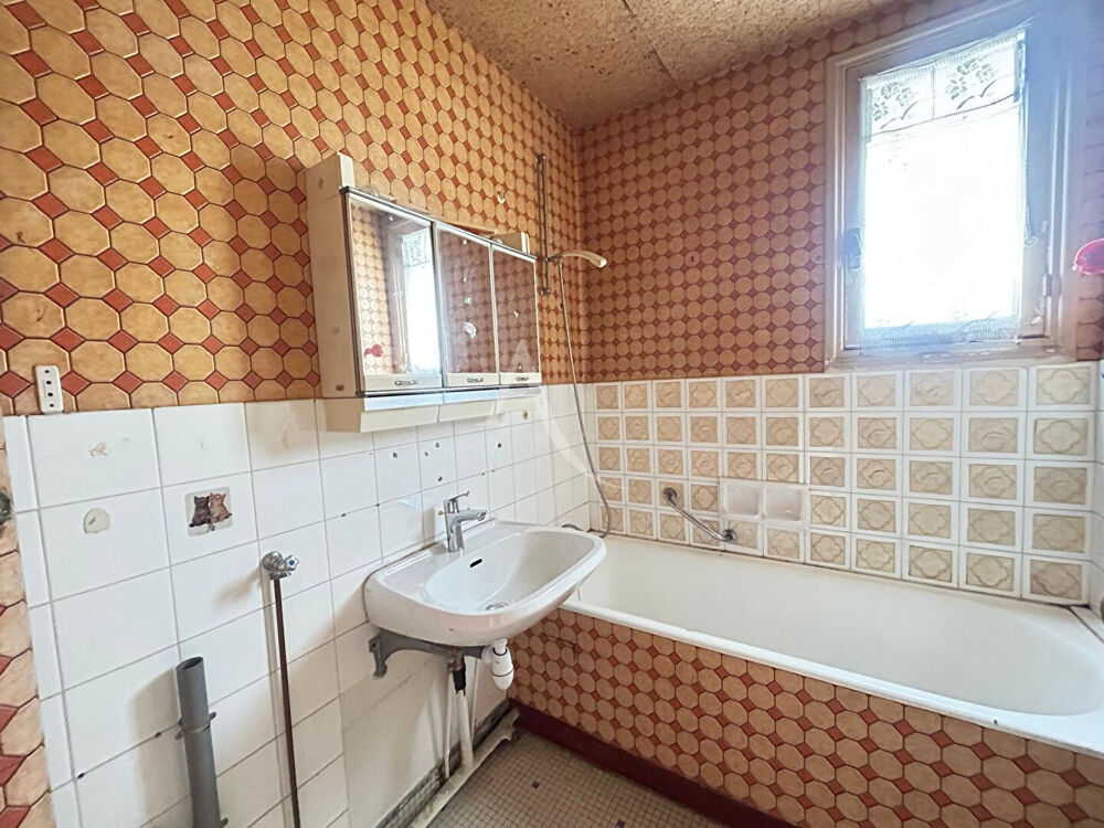 Appartement de type 3 - avec cave et stationnement sécurisé.