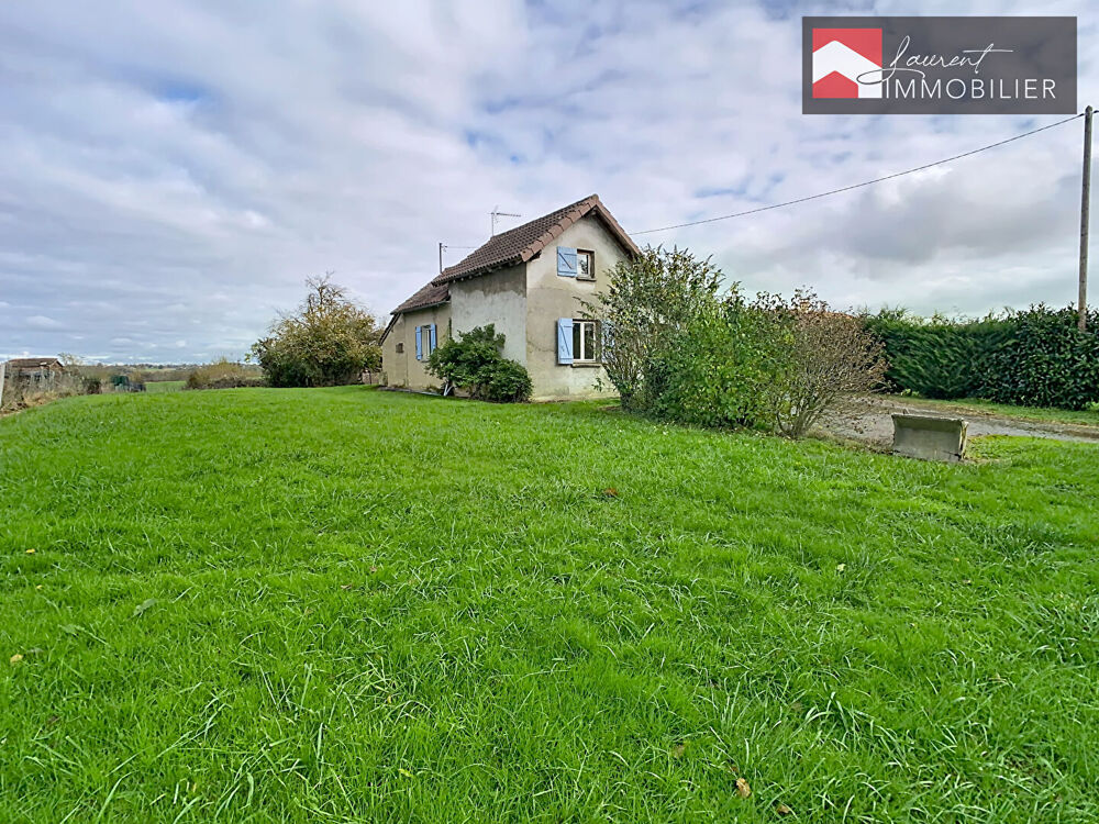 Maison pleine de potentiel sur belle parcelle de terrain