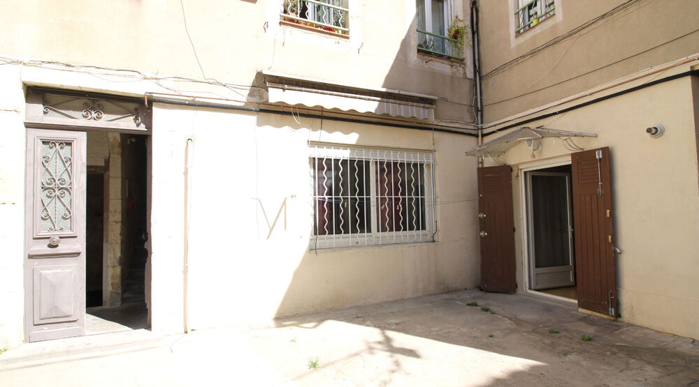 NIMES Proche centre ville et Facultés P2 bis de 56.87 m2 en RDC donnant sur une cour plein SUD.