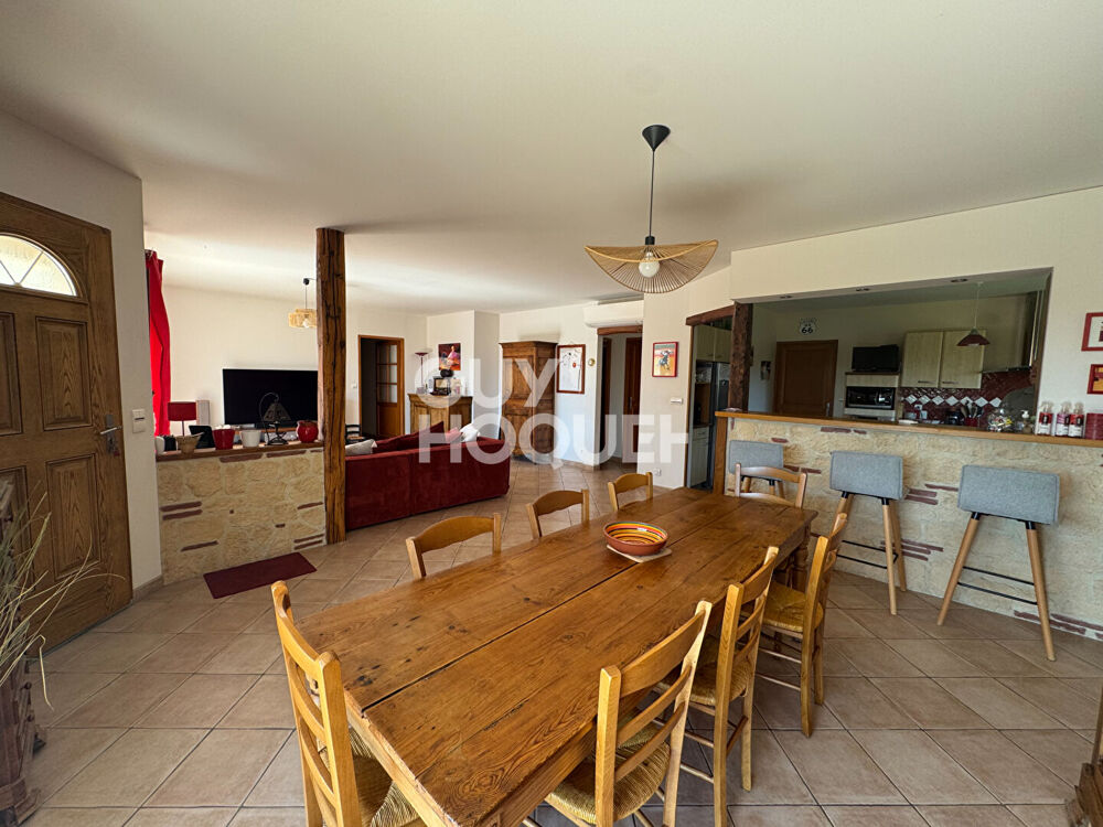 Maison 5 chambres, sous sol complet et jardin.