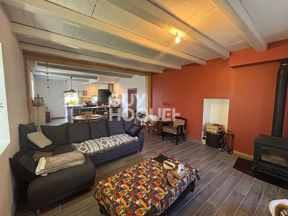Maison en pierre de 160 m² avec revenu locatif + terrain constructible