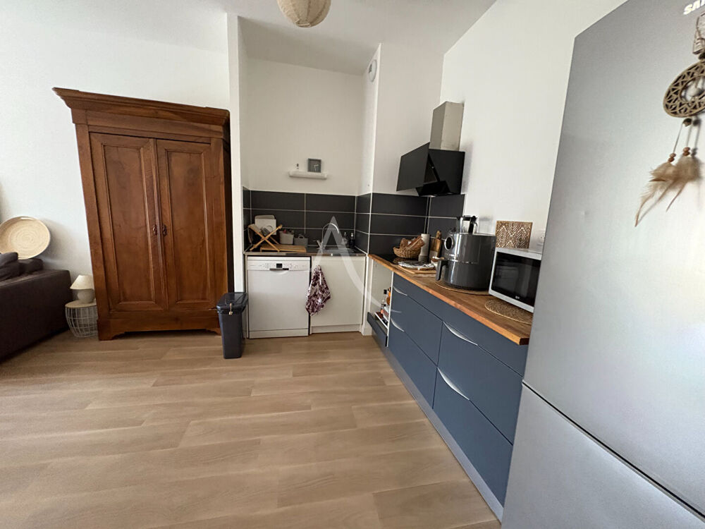 Appartement T3 avec terrasse, cave et double stationnement