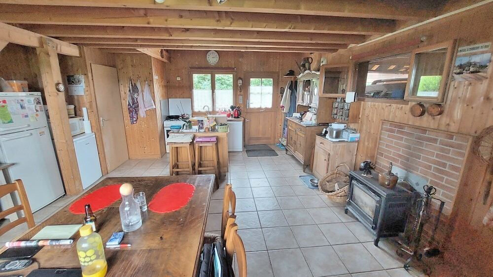 Vente Maison Chalet 7 pièces 100 m2 sur terrain arboré de 948m2, vue sur prairies Charmoille