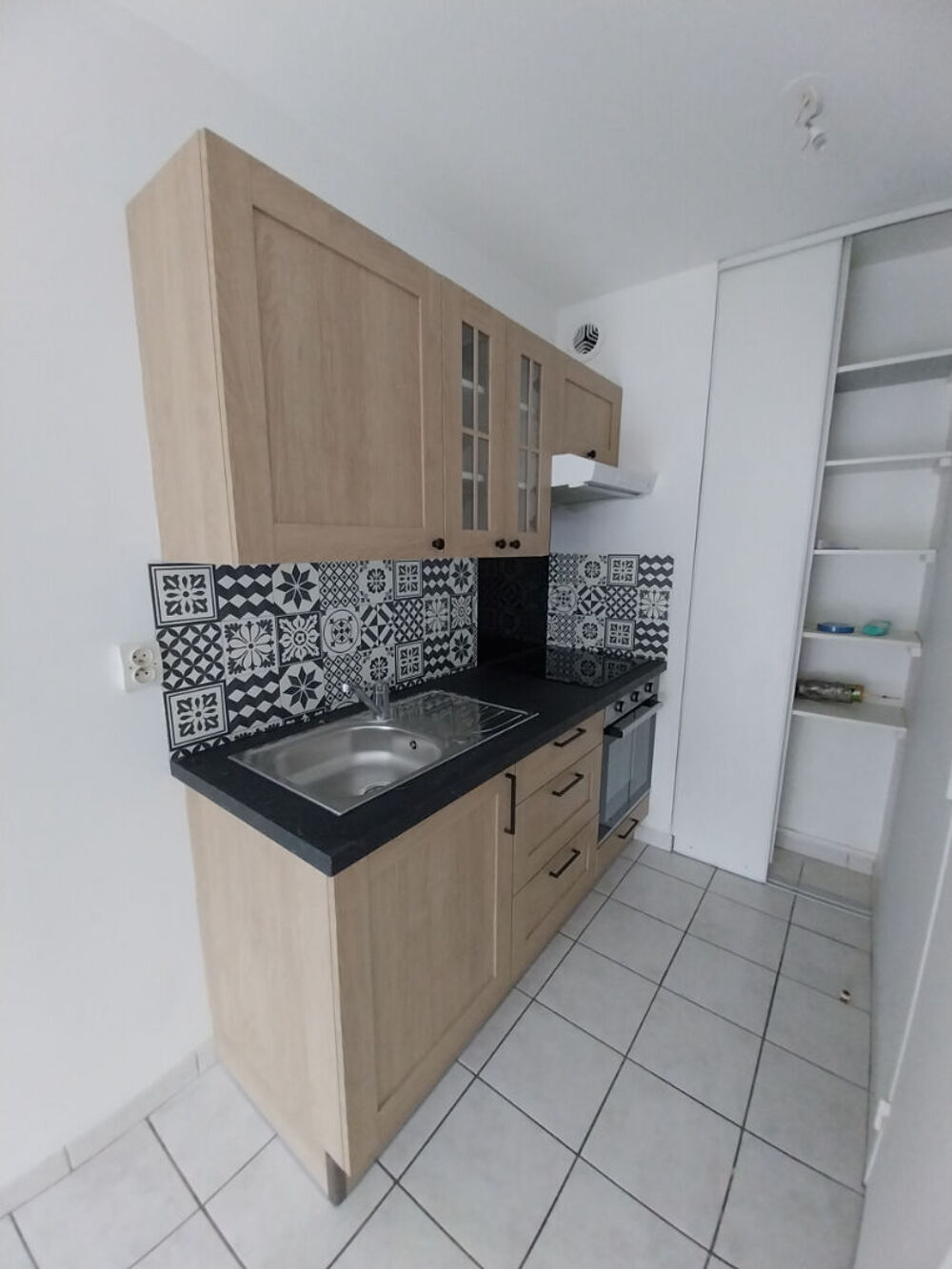 Appartement duplex 42.60m² avec jardinet et garage