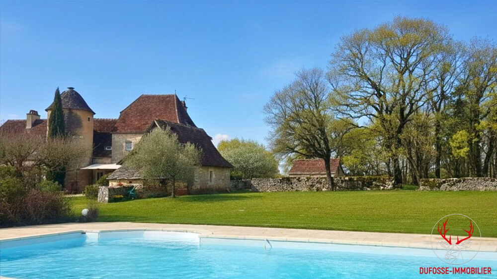 Propriété de charme avec dépendances et 7 hectares dans le lot