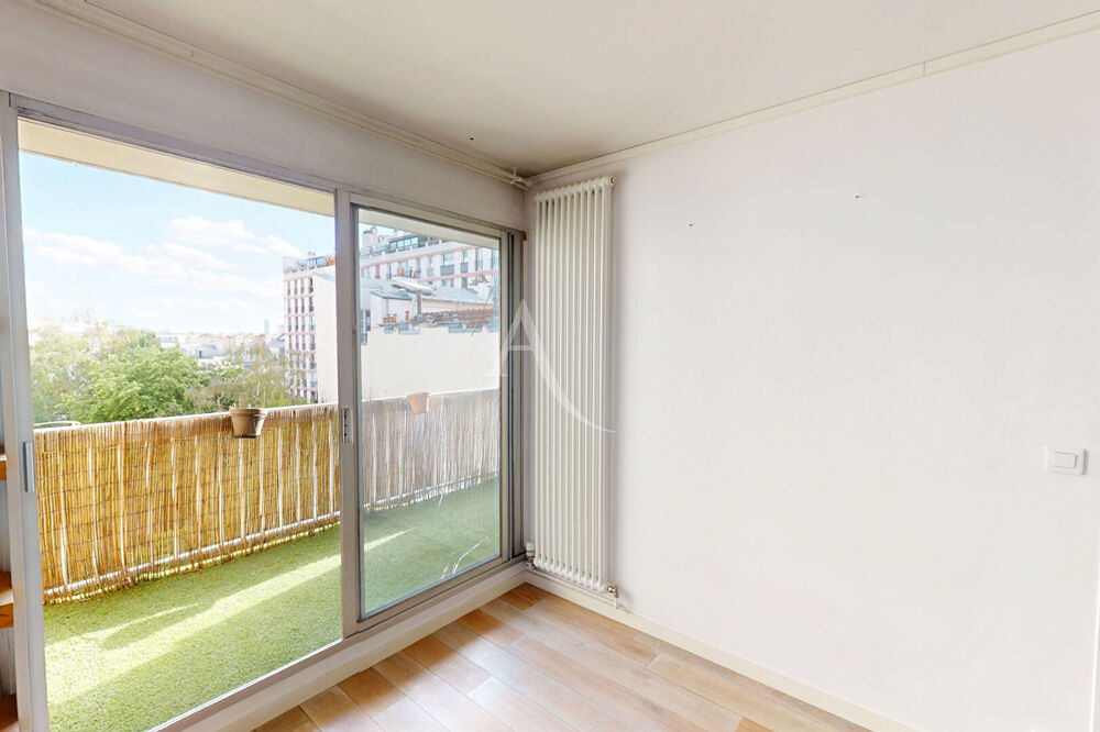 Vente Appartement 2 pièces avec balcon vue sur jardin arboré et exposé plein Sud de 8m2 ! Paris 10