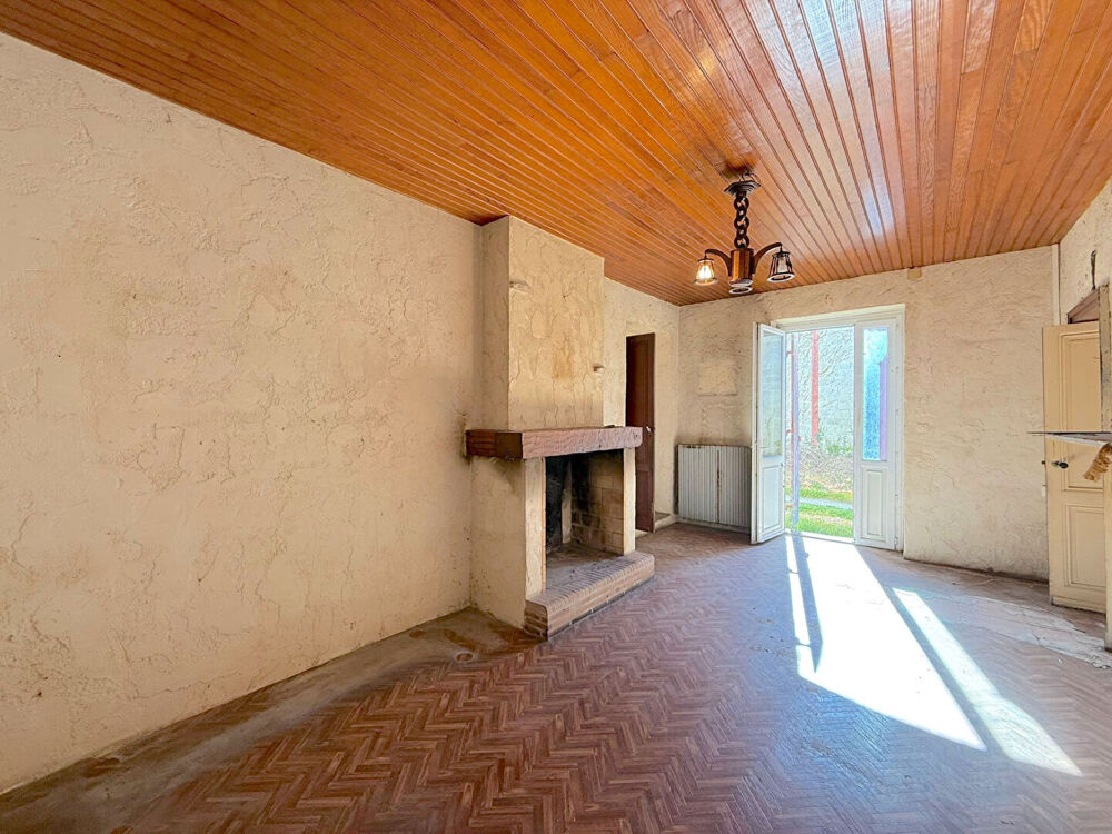 A VENDRE MAISON EN PIERRE AVEC JARDIN ET GARAGE - SECTEUR BLAYE - CARTELEGUES