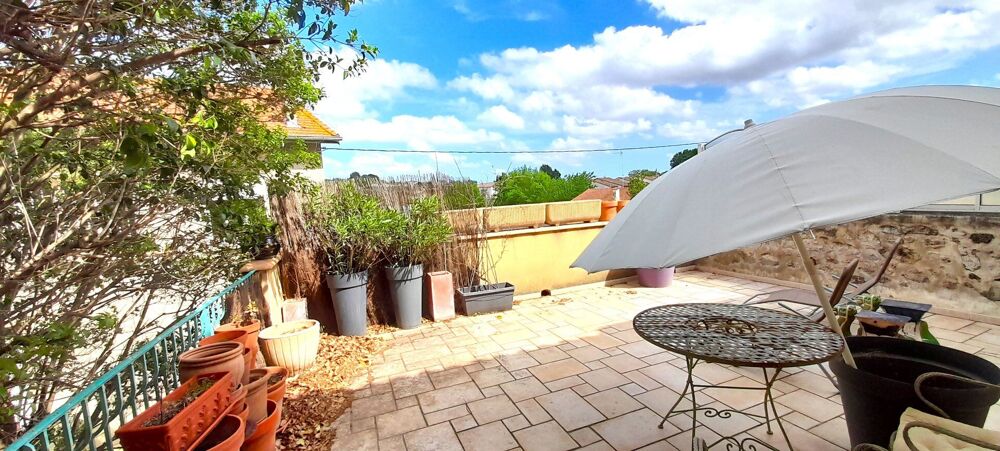 Superbe maison de vigneron avec grand garage, terrasses et jardin.
