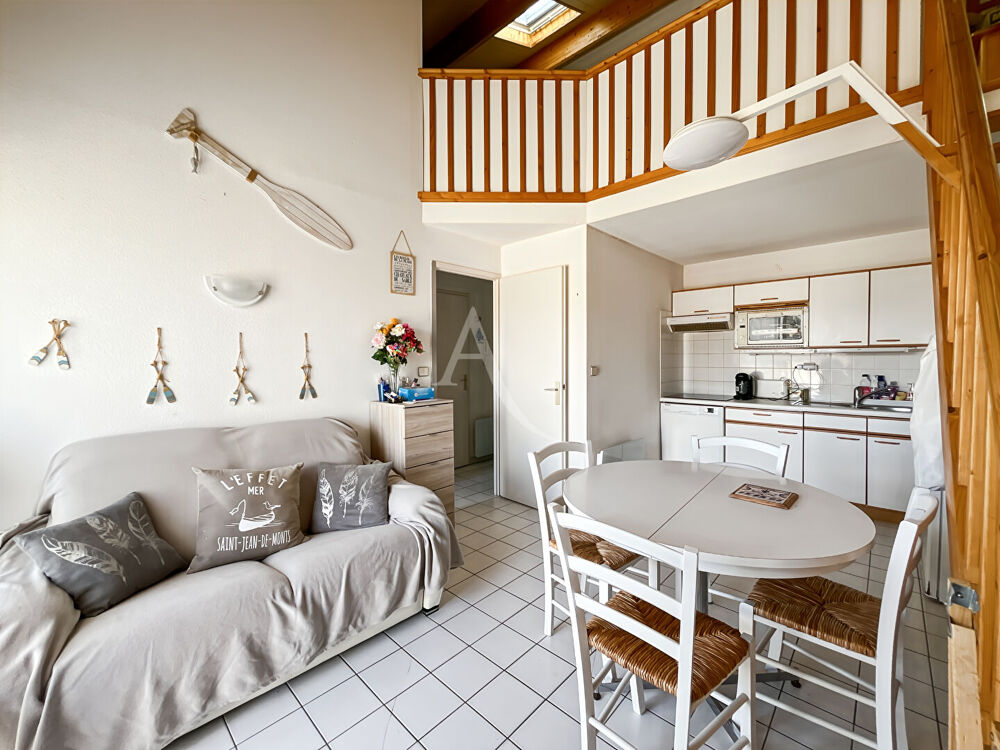 T2 mezzanine proche commerces et plage avec garage