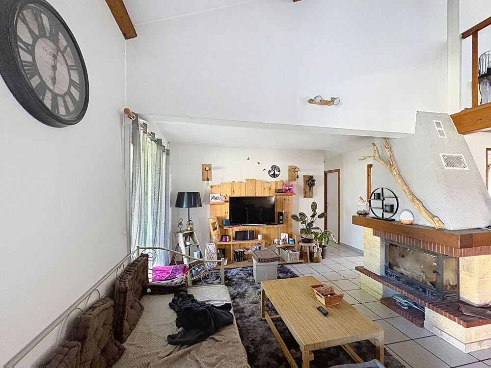 Maison 5 pièce(s) 95 m2 3 chambres et mezzanine avec garage et terrain clos arboré