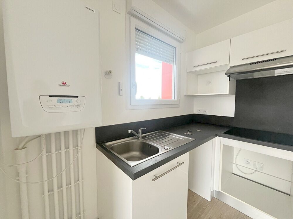 A VENDRE PLOEREN proche bourg appartement 3 pièces en dernier étage 2 places de parking et cave