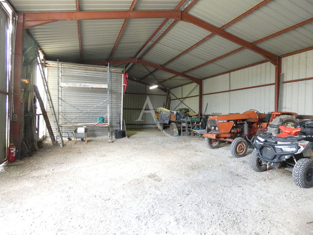 Terrain de 1 000 m² avec Mobil home, 2 hangars Outarville
