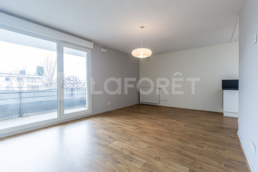 AGENCE IMMOBILIERE LAFORET - "CAREX" - ANNECY - SEYNOD - APPARTEMENT TRAVERSANT T3 de 68m² - CAVE - BALCON