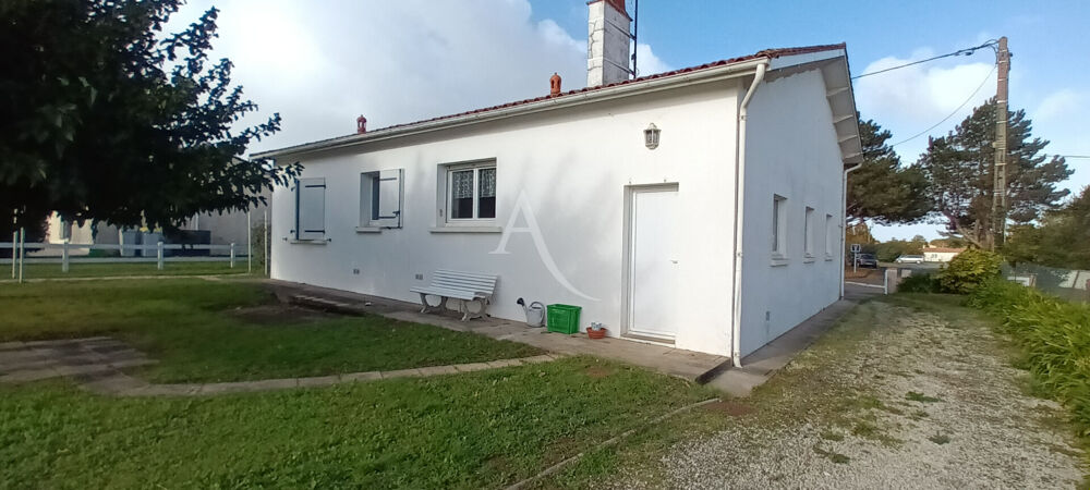 MAISON FAMILIALE AVEC GRAND GARAGE ET JARDIN ARBORÉ