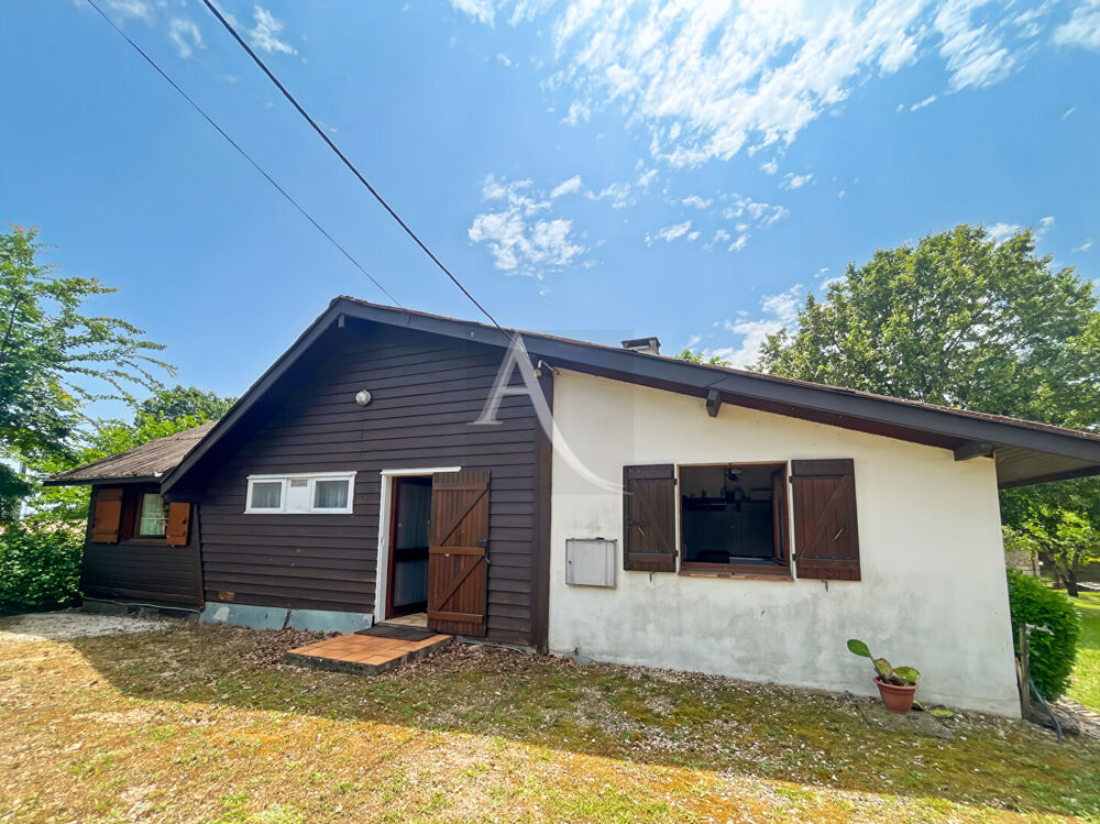 A vendre chalet avec jardin et terrain de tennis