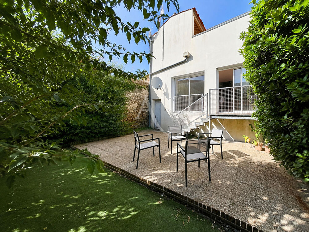 Appartement atypique de 86 m² avec terrasse plein sud en coeur de ville à Challans