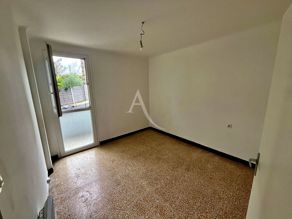Appartement 3 pièces 51.57 m2 traversant parking et cave!