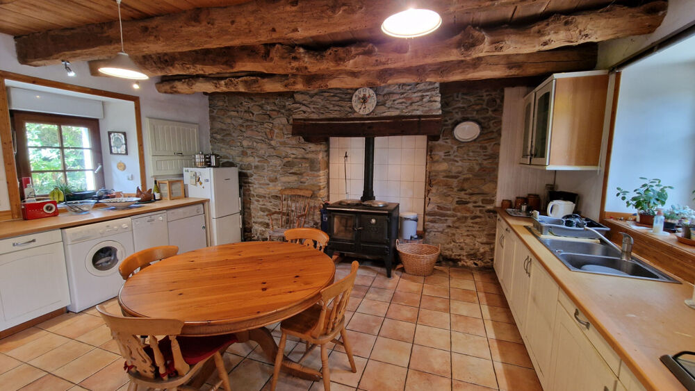 Vente Maison CÔTES D'ARMOR Charmante maison de 2 chambres avec garage et jardin, dans un environnement paisible et proche de la nature. Le mene