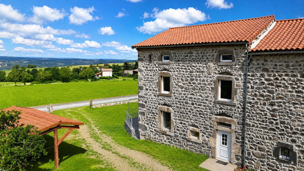 Magnifique corps de ferme rénové avec 5 chambres, dépendances et vue panoramique