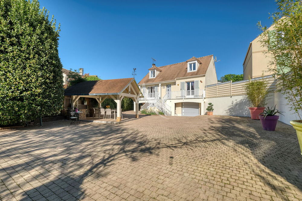 Vente Maison Maison individuelle avec sous-sol total, jardin intimiste de 2 412 m2 et suite parentale au RDC Esbly